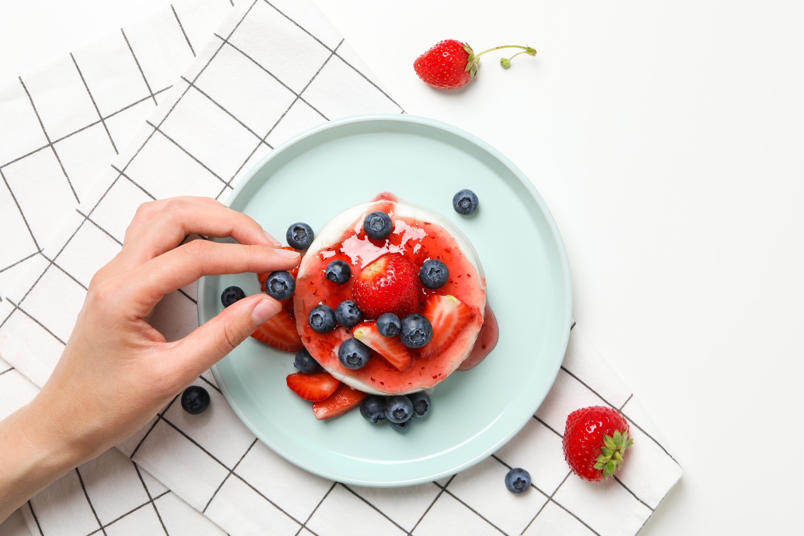 hand holding cheese dish